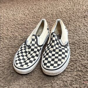 Vans men’s  Black and White Checkered Slip-On Sneakers